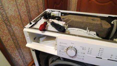 Поломанная стиральная машина