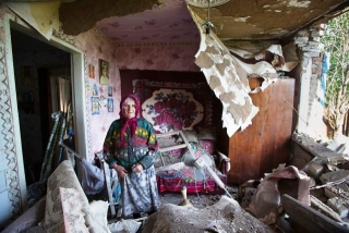 Разрушенный дом несчастной женщины.